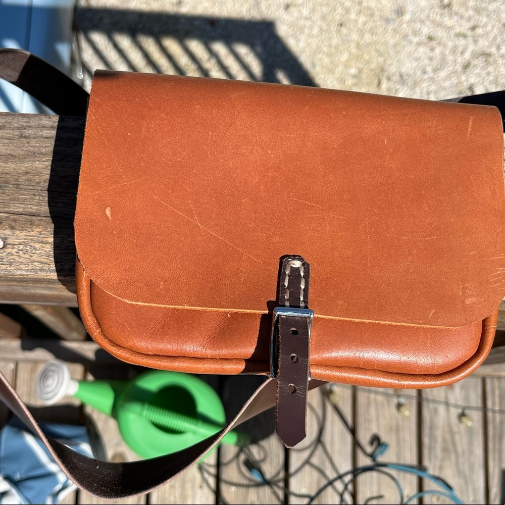 Hand stitched leather purse/clutch